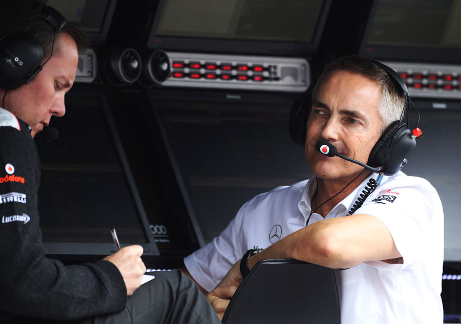 Martin Whitmarsh speaks to Sam Michael on the McLaren pit wall