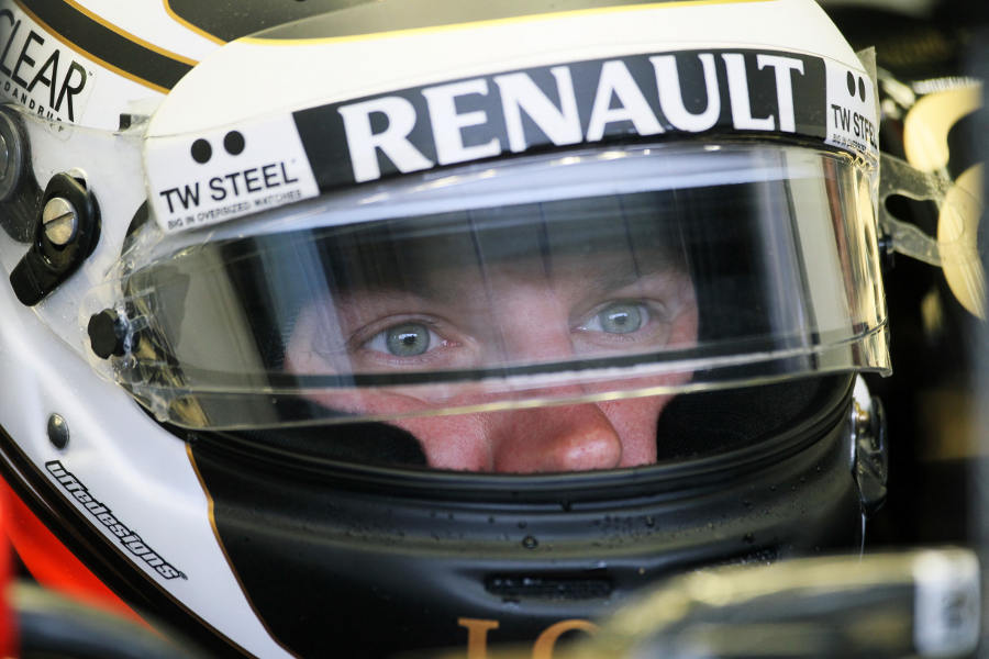 Kimi Raikkonen focuses in the cockpit of his E20