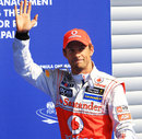 Jenson Button celebrates taking pole position at Spa