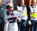 Kamui Kobayashi celebrates taking second on the grid