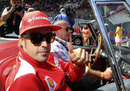 Championship leader Fernando Alonso heads off on the drivers' parade