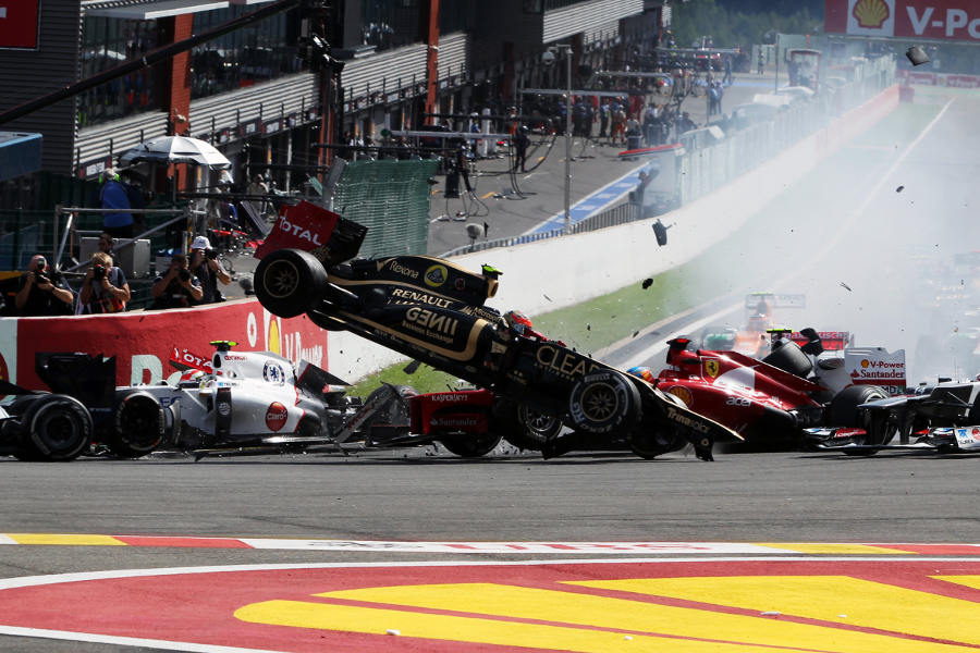Romain Grosjean, Fernando Alonso and Lewis Hamilton are taken out in a spectacular first corner crash