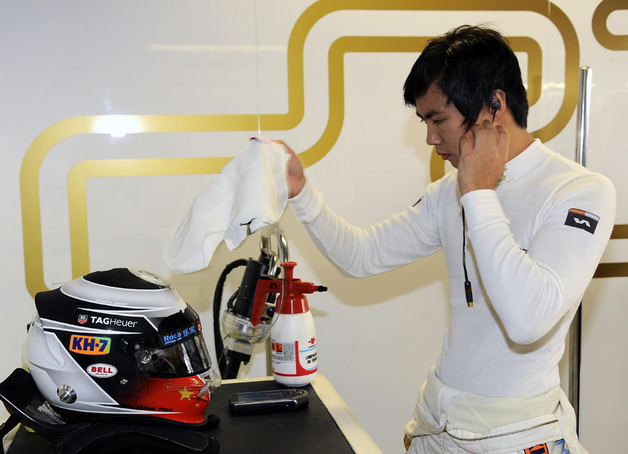 Ma Qing Hua prepares for his first outing in an F1 car