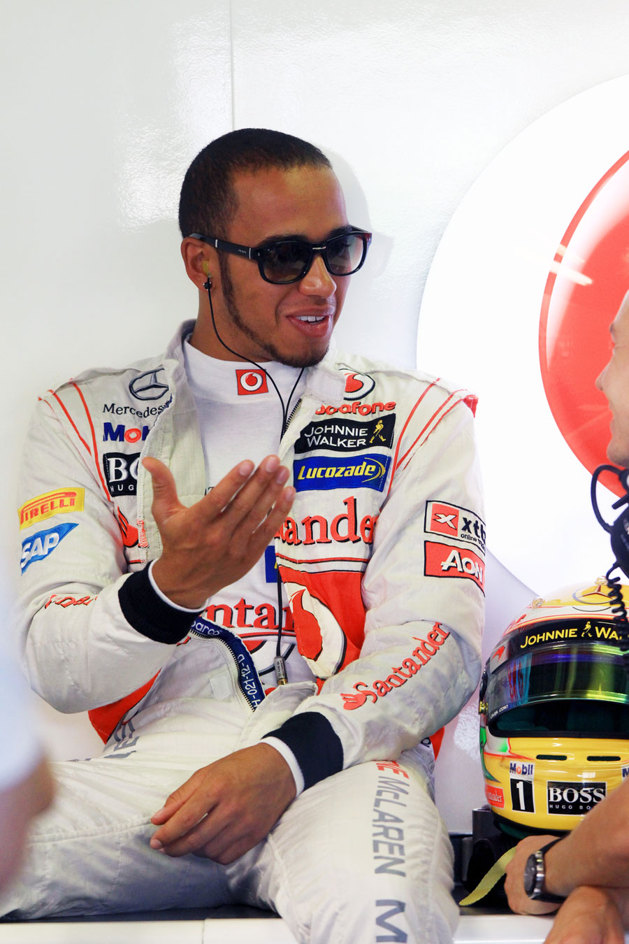 Lewis Hamilton in relaxed mood in the McLaren garage