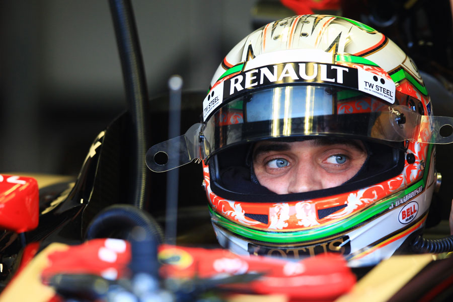 Jerome d'Ambrosio sits in the Lotus garage awaiting the start of his first session since Brazil 2011