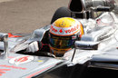 Lewis Hamilton returns to parc ferme after securing pole