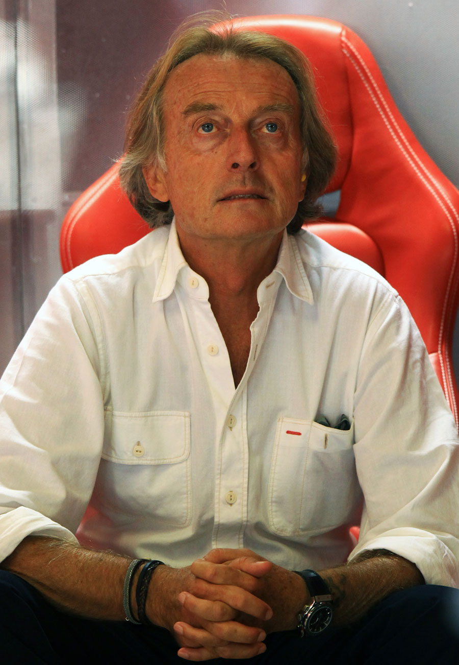 Luca di Montezemolo watches on from the Ferrari garage