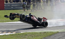 Jean-Eric Vergne launches his car over the kerbs at turn one