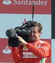 The hunted turns hunter: Fernando Alonso behind the camera for once