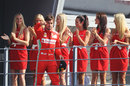 Fernando Alonso celebrates on the podium