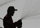 Fernando Alonso sprays the Ferrari faithful