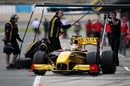 Vitaly Petrov pulls away from the Renault pit