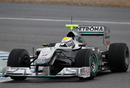 Nico Rosberg runs on full wet tyres on a damp track