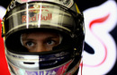 Sebastian Vettel prepares himself for a wet run