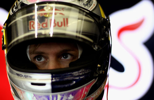 Sebastian Vettel prepares himself for a wet run