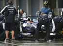 Williams practice a pit stop in the rain