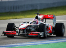 Jenson Button gets back out on track in the McLaren