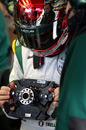 Jarno Trulli familiarises himself with the Lotus steering wheel