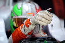 Tonio Liuzzi prepares himself for a run in the Force India
