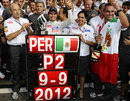 Sergio Perez celebrates his second place with Peter Sauber, Monisha Kaltenborn and the rest of the team