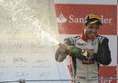 Tio Ellinas celebrates victory on the podium