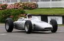 Sir Jackie Stewart displays a Porsche during a Dan Gurney tribute at the Goodwood Revival