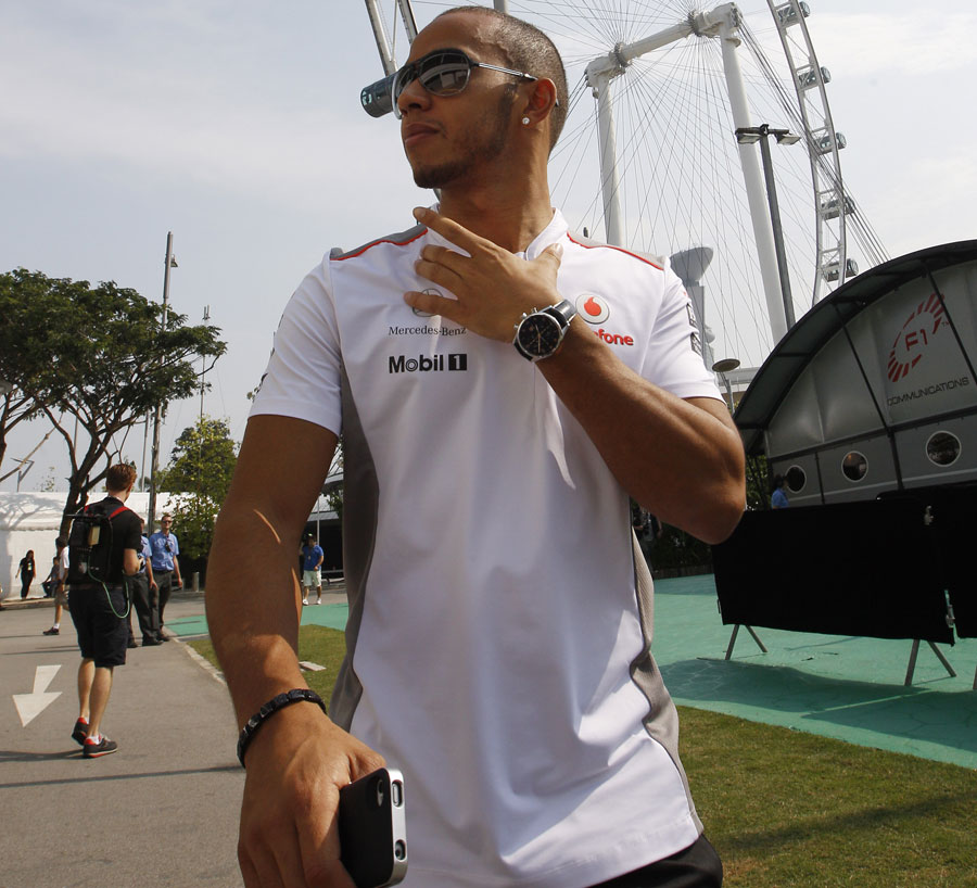 Lewis Hamilton arrives in the paddock on qualifying day