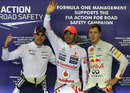 The top three drivers celebrate after qualifying