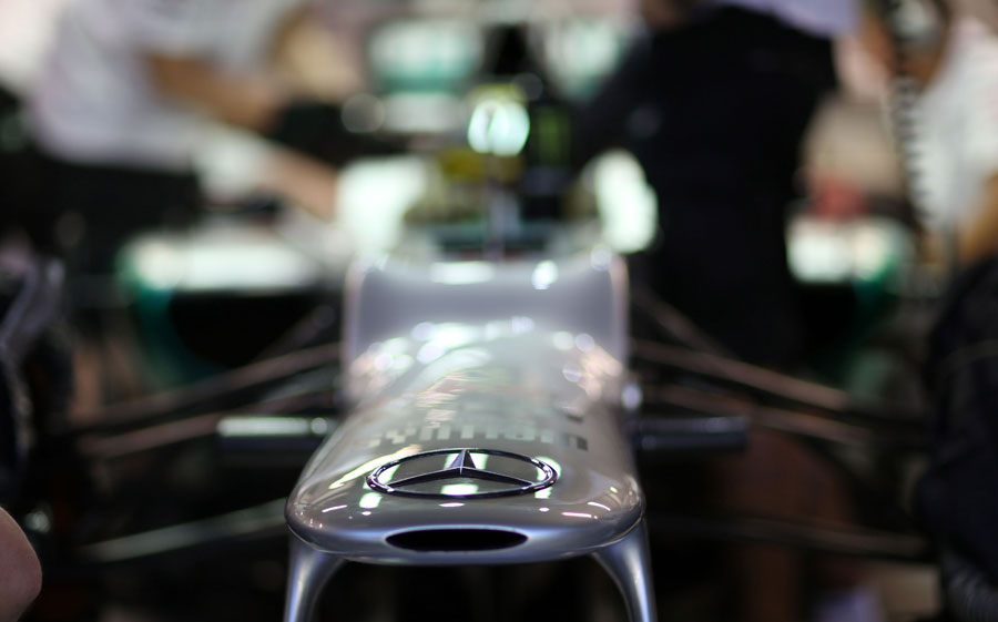The Mercedes badge on the front of Nico Rosberg's car