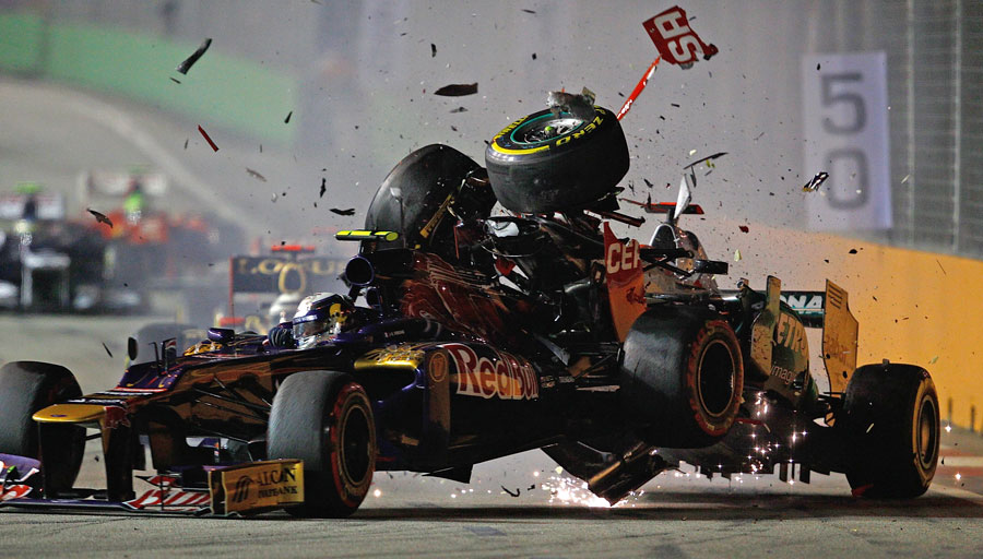 Michael Schumacher crashes into the rear of Jean-Eric Vergne