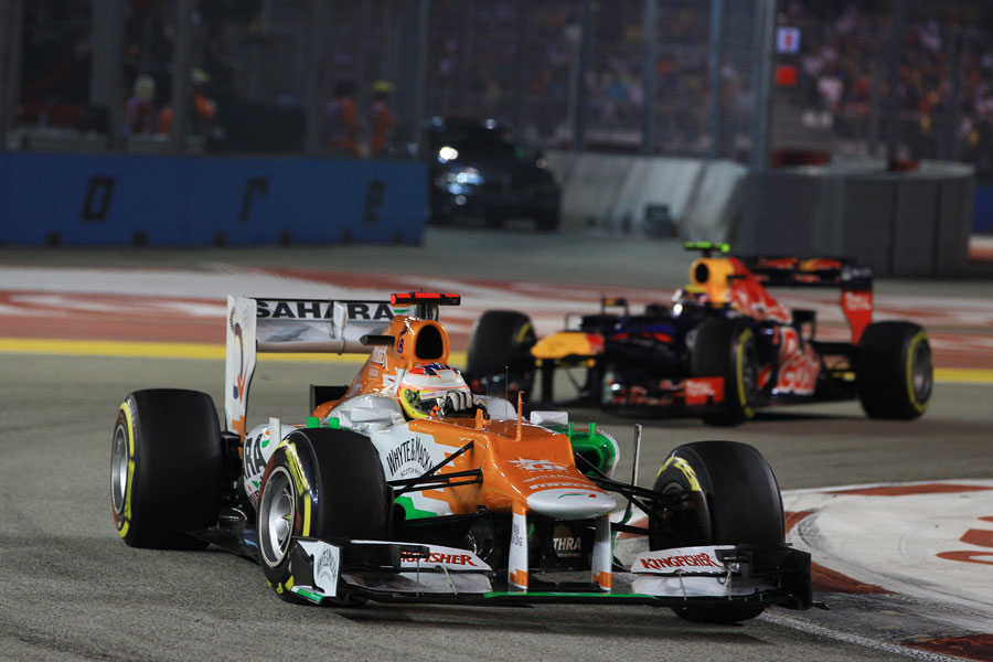 Paul di Resta rounds turn three with Mark Webber close behind