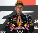 Sebastian Vettel celebrates on the podium
