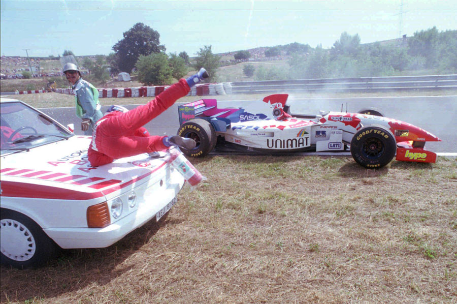 Taki Inoue is hit by a marshal car coming to help him after he retired with a blown engine