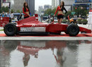 Models pose in downtown Seoul to promote this year's Korean Grand Prix