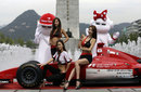 Models pose in downtown Seoul to promote this year's Korean Grand Prix