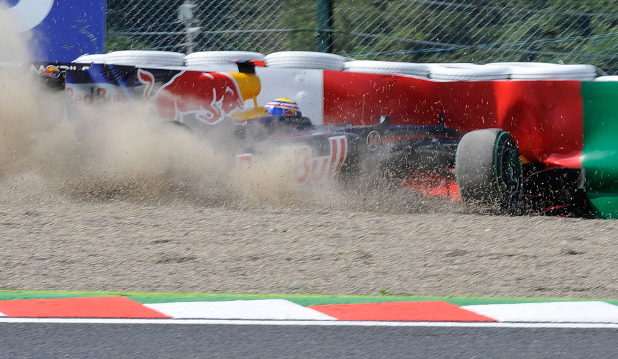 Mark Webber buries his Red Bull in to the barrier during FP3