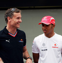 David Coulthard shares a joke with Lewis Hamilton at the Brazilian Grand Prix