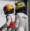 Lewis Hamilton celebrates with race winner Nico Rosberg