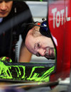 Adrian Newey inspects aero paint at the rear of the Red Bull