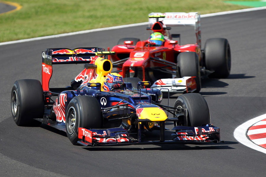Mark Webber leads Felipe Massa on track