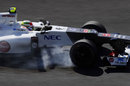 Sergio Perez locks a wheel under braking