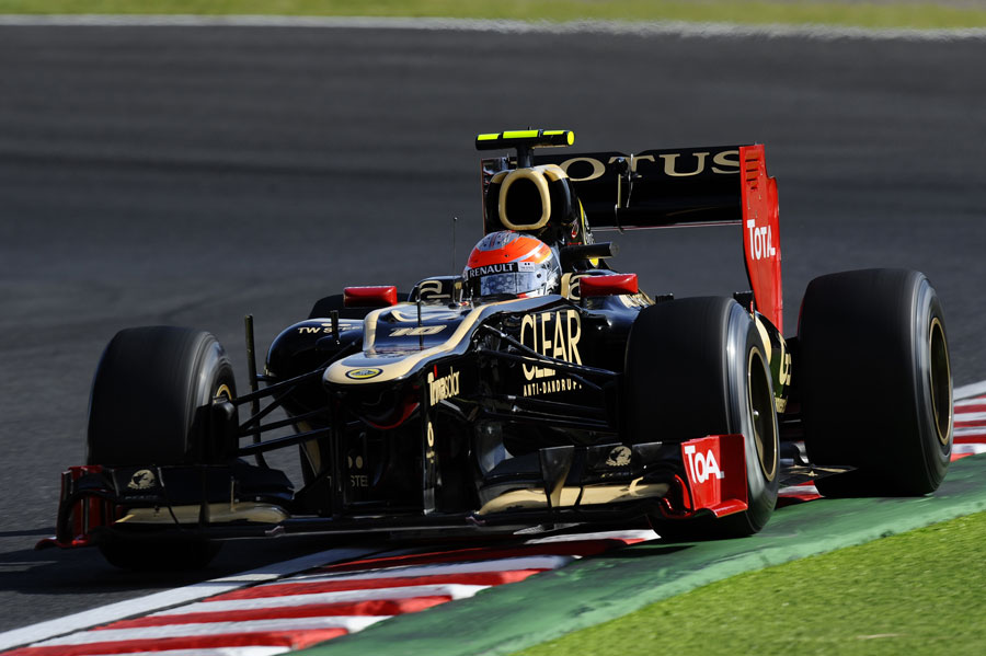 Romain Grosjean on track in the Lotus