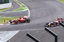 Fernando Alonso passes Sebastian Vettel through the final chicane
