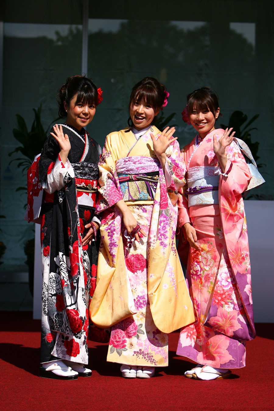 Girls in traditional dress in the paddock