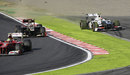 Sergio Perez is forced wide in turn one by Kimi Raikkonen