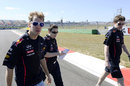 Sebastian Vettel walks the track with his engineers