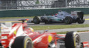 Fernando Alonso following Michael Schumacher during FP1