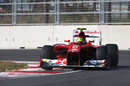 Felipe Massa takes plenty of kerb on supersoft tyres