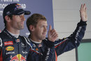 Mark Webber and Sebastian Vettel in parc ferme after qualifying