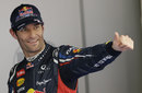 Mark Webber celebrates in parc ferme after qualifying